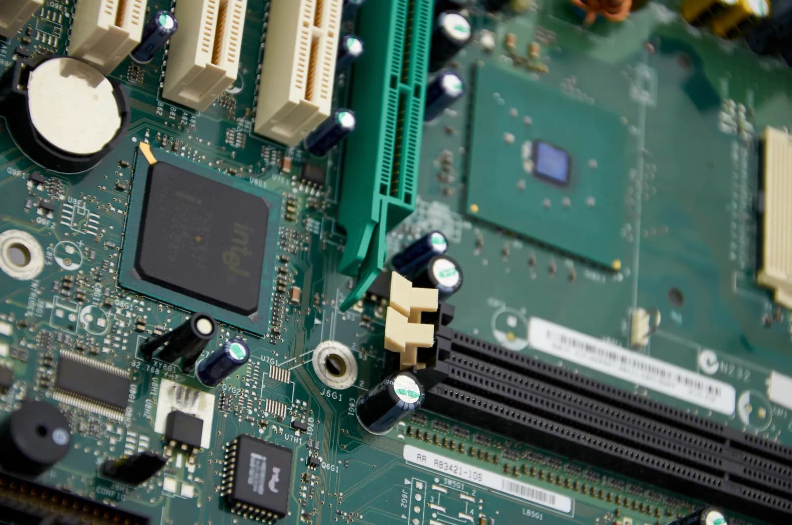 Close-up of a computer motherboard, representing AI system implementation